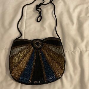 Vintage beaded evening bag, black,blue, gold, copper and silver.
